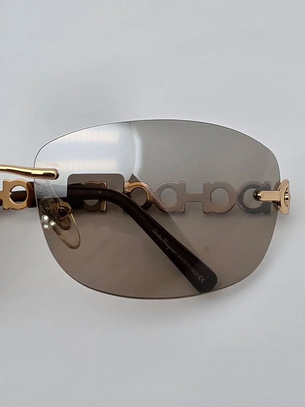 Salvatore Ferragamo 1055 Gold Gancini Frame Gold Mirror Rimless Sunglasses 61mm